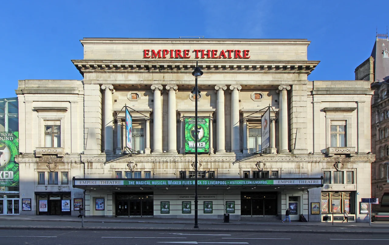 Viewed across Lime Street. Grade II listed theatre built 1920s for Moss Empires. Loosely neo-classical style with innovations in audience seating arrangement.