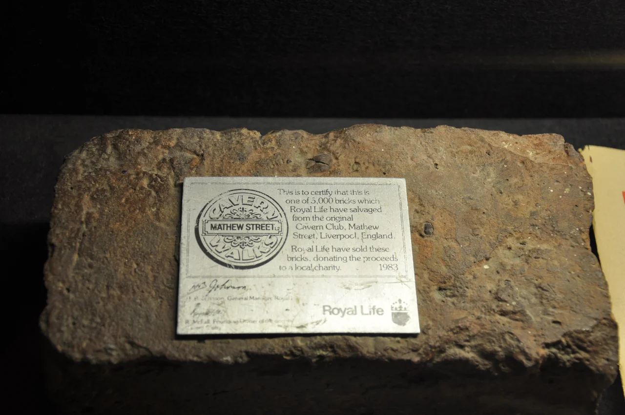 CAVERN WALKS, MATHEW STREET L2
          This is to certify that this is
               one of 5,000 bricks which
                 Royal Life have salvaged
                  from the original
                   Cavern Club, Mathew
                  Street, Liverpool, England.
                 
                 Royal Life have sold these
               bricks, donating the proceeds
            to a local charity.         1983

H. B. Johnson. General Manager . Royal Life
R. McFall. Founding Owner of the original
Cavern Club

                                   Royal Life