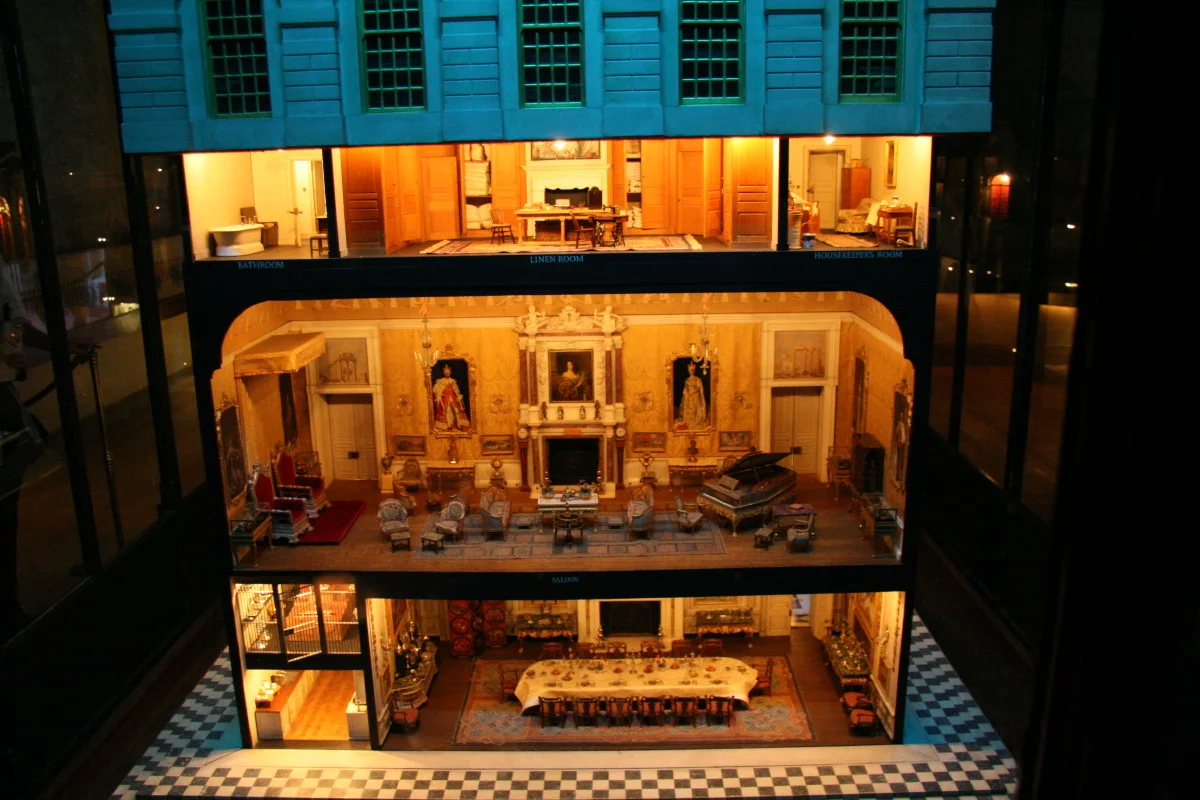 Cameras not allowed....yawn. Snuck this shot in. The dollhouse had an amazing amount of detail in it—real silver plates on the table, etc.
View at full size to see the detail.
(I should have got something else in frame to give it some perspective.)