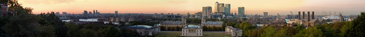 A 12 image panorama of the view from Greenwich Park, with the Queen's House in the foreground. The Old Royal Naval College and Docklands are in the background. In the distance and to the left, St. Pauls Cathedral and Tower Bridge can be seen. The Greenwich Park view offers one of the best panoramic views in London.