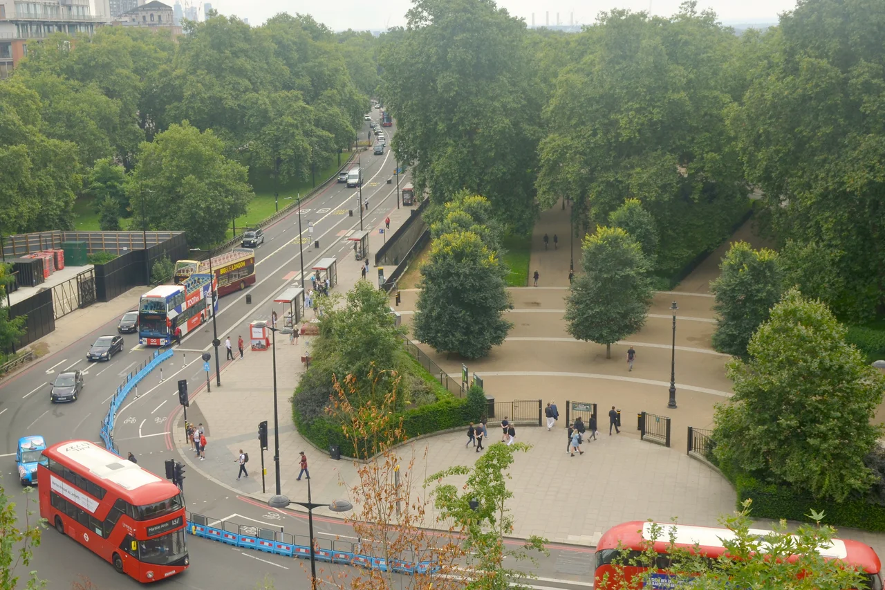View of Park Lane, Cumberland Gate and Speakers' Corner, Hyde Park, London from the Marble Arch Mound in August 2021.