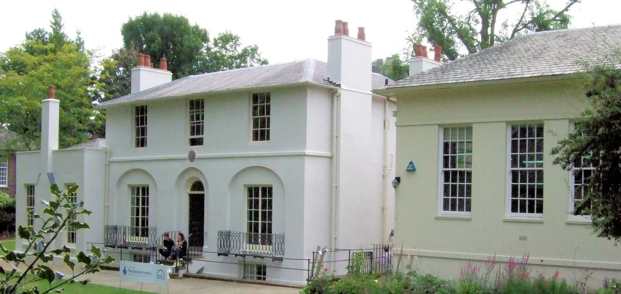 House in Hampstead occupied by poet John Keats and now a museum next the Heath branch Public Library on the right