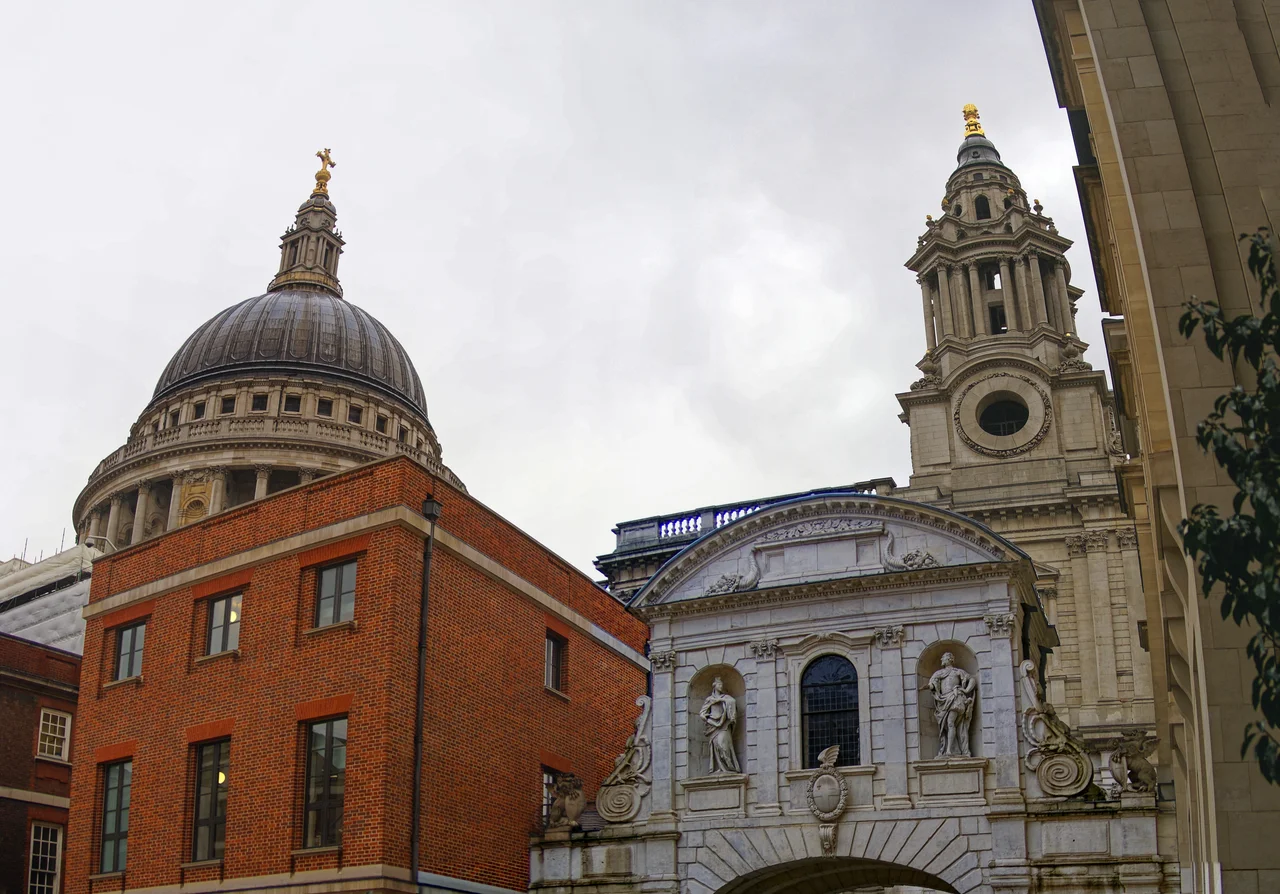 A view from the south of Paternoster Square in London, England from the top viewing deck of St. Paul's Cathedral next door. Paternoster Square, City of London, England – the building on the right, with the seven columns is the new home of the London Stock Exchange.