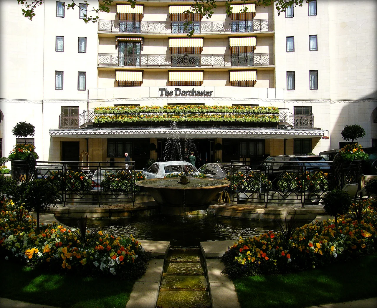 Front of The Dorchester, a luxury hotel on Park Lane in Mayfair, London, overlooking Hyde Park.