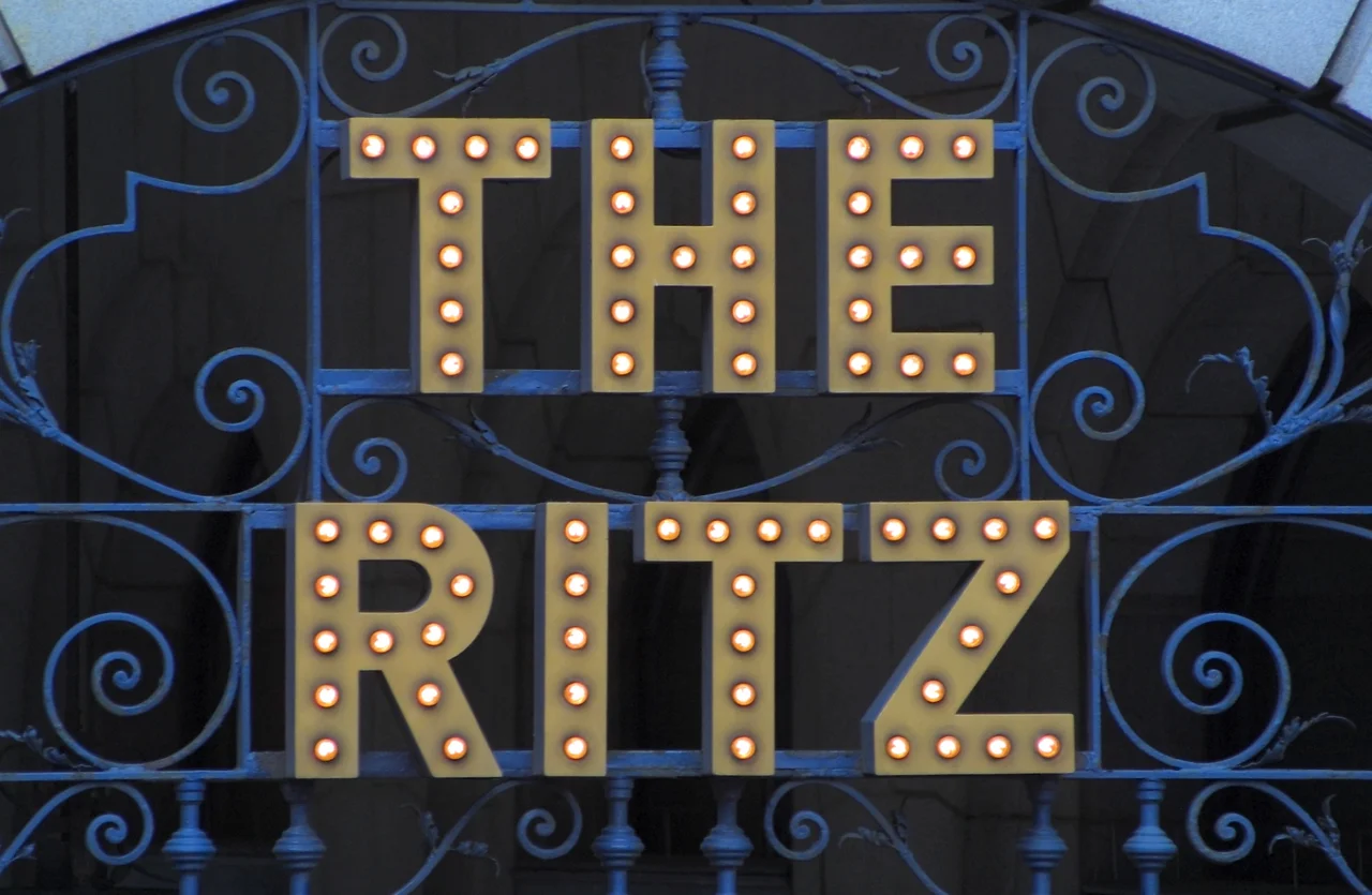 A view of the sign above the western entrance to Ritz hotel Ritz arcade on Piccadilly. The image was taken with a Canon EOS D30 with a Sigma 70-300mm lens.