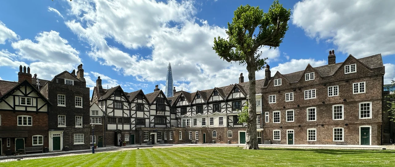 Panoramic view from the Tower of London. The White Tower is on the right and Wakefield Tower is on the left. In the background on the left can be seen the east side of Traitor's Gate.