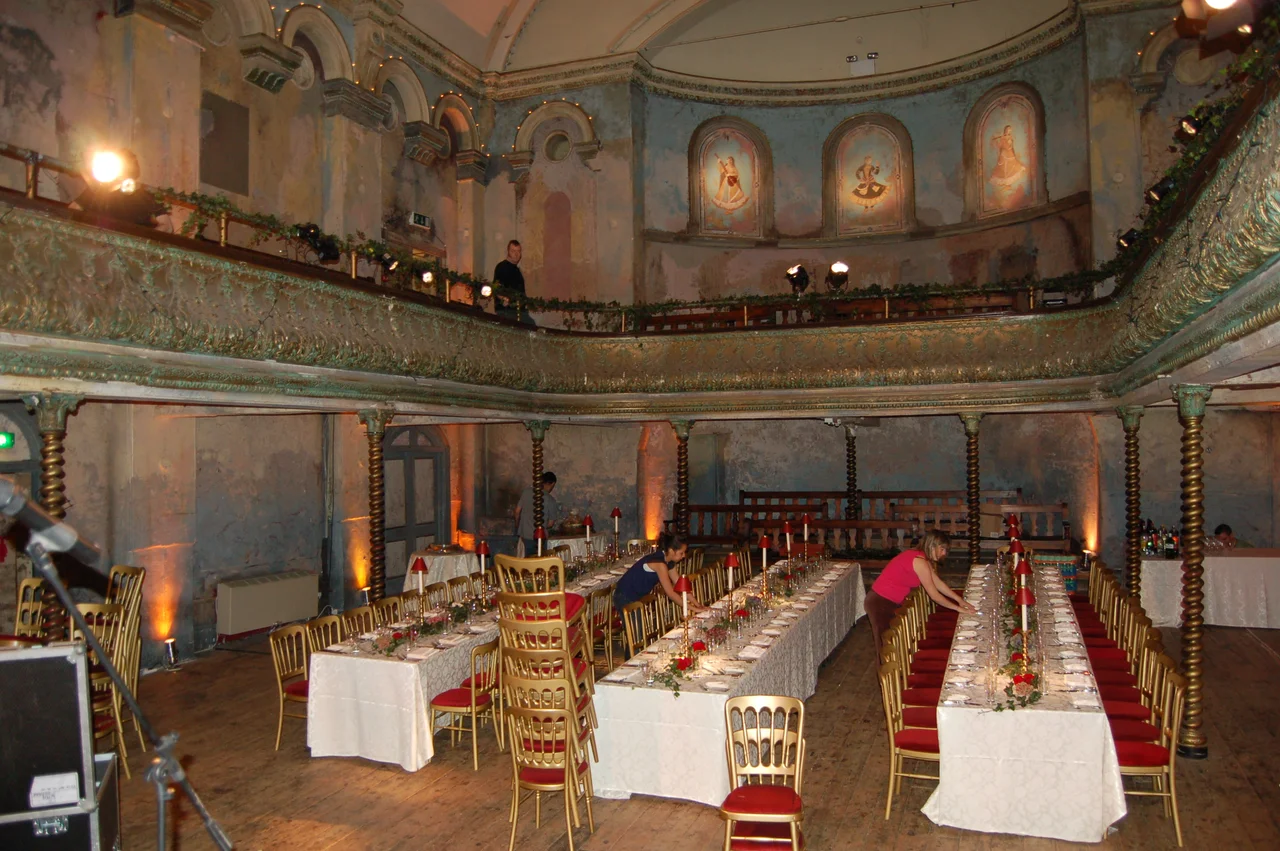 Use freely, pls attribute - K. Thompson
Interior view of Wilton's Music Hall (London Borough of Tower Hamlets), with tables being laid for a wedding. A similar layout would have been used when Wilton's was used as a supper club.