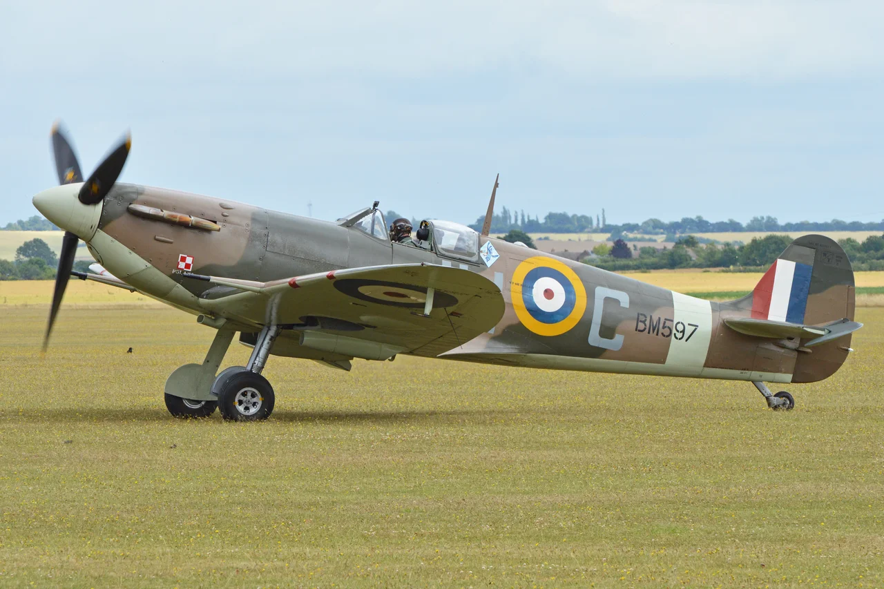 c/n CBAF.2461.
Operated by The Historic Aircraft Collection and based at Duxford wearing genuine 317sqn markings.
2015 Flying Legends Airshow.
Duxford, Cambridgeshire, UK.
12-7-2015
The following info is from the Flying Legends website:-
"One of 1000 aircraft built at Castle Bromwich against contract B981687/39, BM597 was delivered to No.37 M.U. at Burtonwood on 26 February 1942, being assigned to 315 Sqn on 7 May 1942 and on to 317 Sqn on 5 September 1942, both at Woodvale. On 13 February 1943, it suffered Cat B damage and was removed for repair on 28 February. It was ready for collection again on 2 June and No. 33 M.U. took delivery and on 9 June it was allocated to Vickers Armstrong for an undisclosed purpose. It returned to No.39 M.U. Colerne on 23 November before moving to No. 222 M.U.High Ercall (Packing Depot) on 4 January 1944 and then back to No. 39 M.U. on 14 April. It was stored there for almost a year until it was issued to No. 58 OTU, its last operational unit from which it was retired on 16 October 1945. It was then transferred to instructional airframe status at No. 4 S of TT, St Athan as 5713M.
Following St Athan, BM597 was assigned to Hednesford (1950-1955, Bridgenorth (1955-1960) and Church Fenton (1960-1989) as gate guardian. On 23 January 1967 it was dispatched from Henlow to Pinewood where it was used as the master for the moulds that were made to cast the fibre glass replicas used in the film ‘Battle of Britain’. It remained at Pinewood until August 1968 when it was returned to Henlow and finally to Church Fenton in 1969. Tim Routsis, the founder of Historic Flying, recovered the aircraft in 1989 as part of a deal with the RAF and sold it to HAC in 1993 with Historic Flying undertaking the complete restoration to original specification and flies now in the colours of 317 Squadron, though in an earlier camouflage paint scheme."