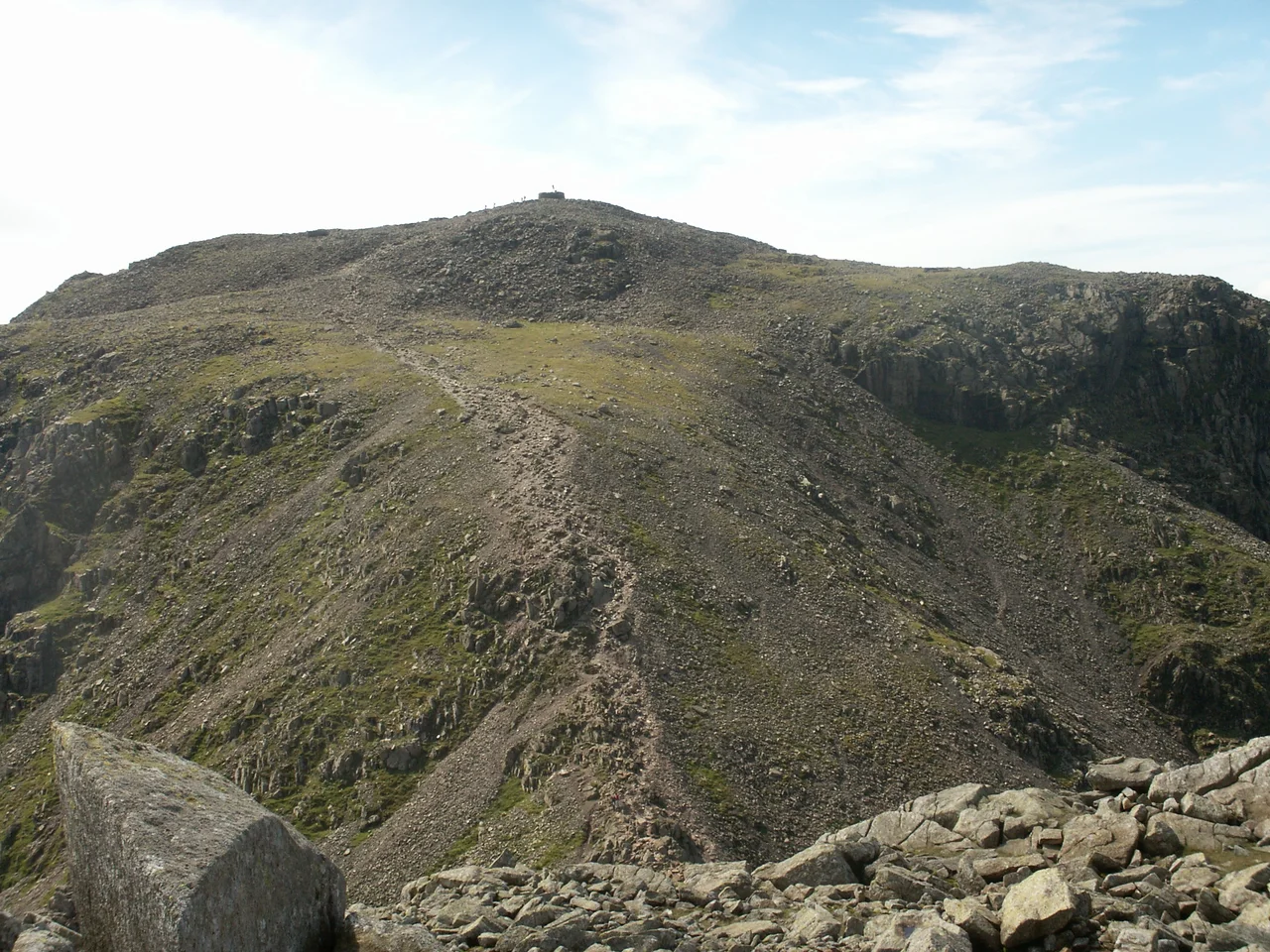 The summit of England's highest peak, Scafell Pike, seen from neighbouring Broad Crag. My own photo.