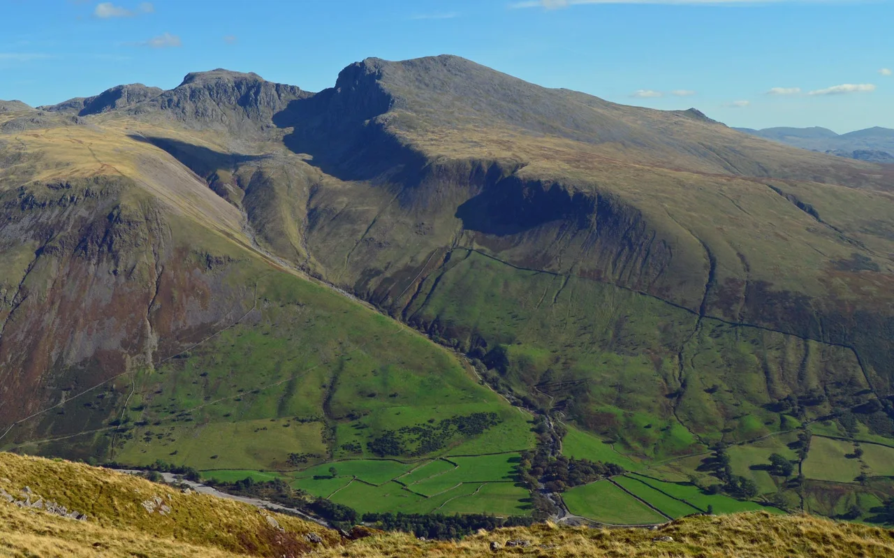 View of the Scafell massif from Yewbarrow, Wasdale, Cumbria. The field enclosure boundaries can clearly be seen.