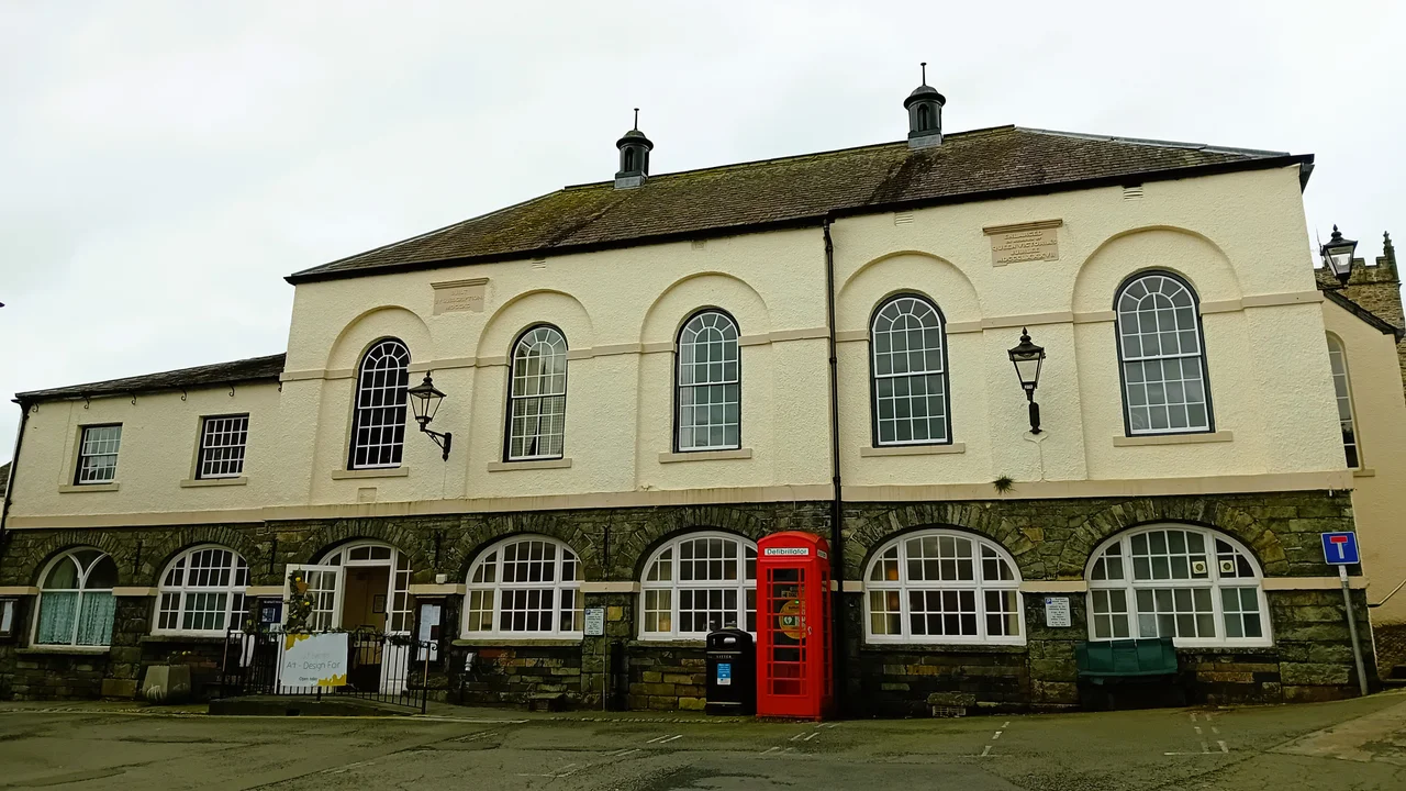 Market Hall, formerly also called Town Hall: Built 1790, extended 1887. Now meeting place of Hawkshead Parish Council and community hall.