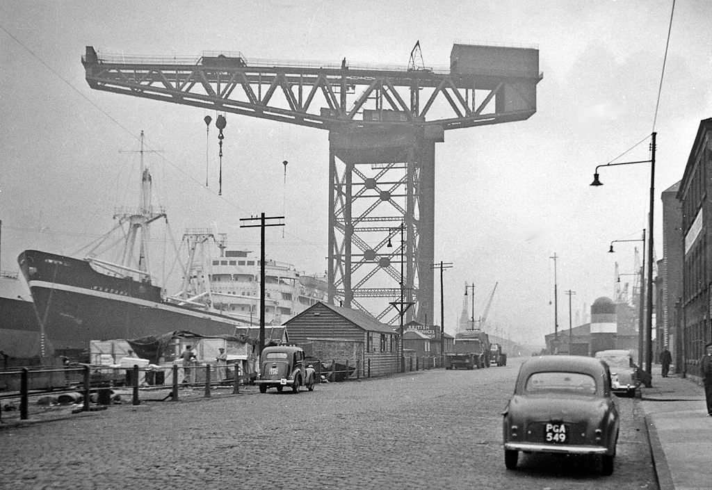 Stobcross Quay and the Finnieston Crane.
Govan, Glasgow, Great Britain. View westward: a symbolic view of Glasgow as a busy port and shipbuilding centre - back in 1957.