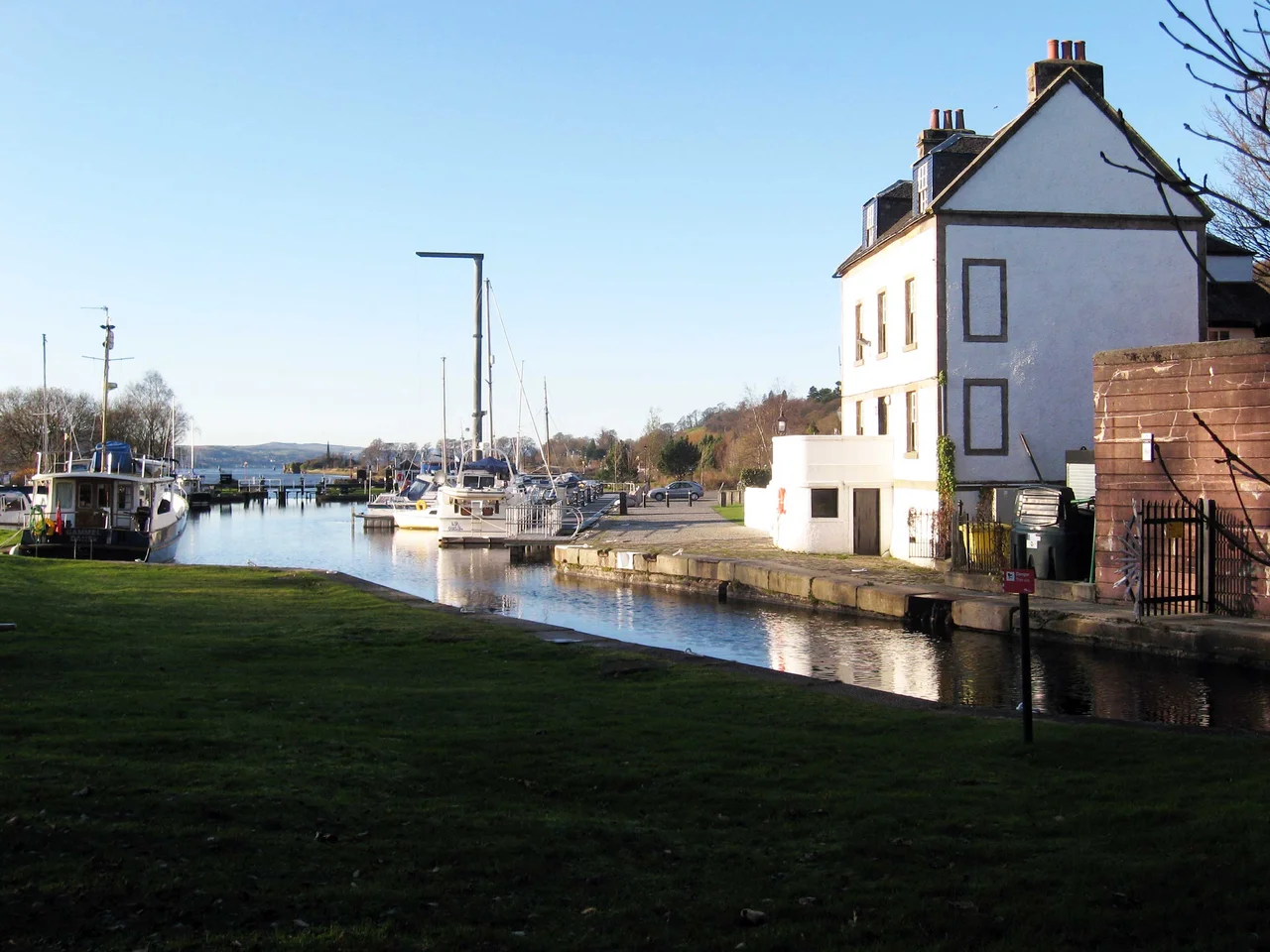 Bowling Basin, on the Forth and Clyde Canal at Bowling, West Dunbartonshire, looking towards the sea lock and the River Clyde.
