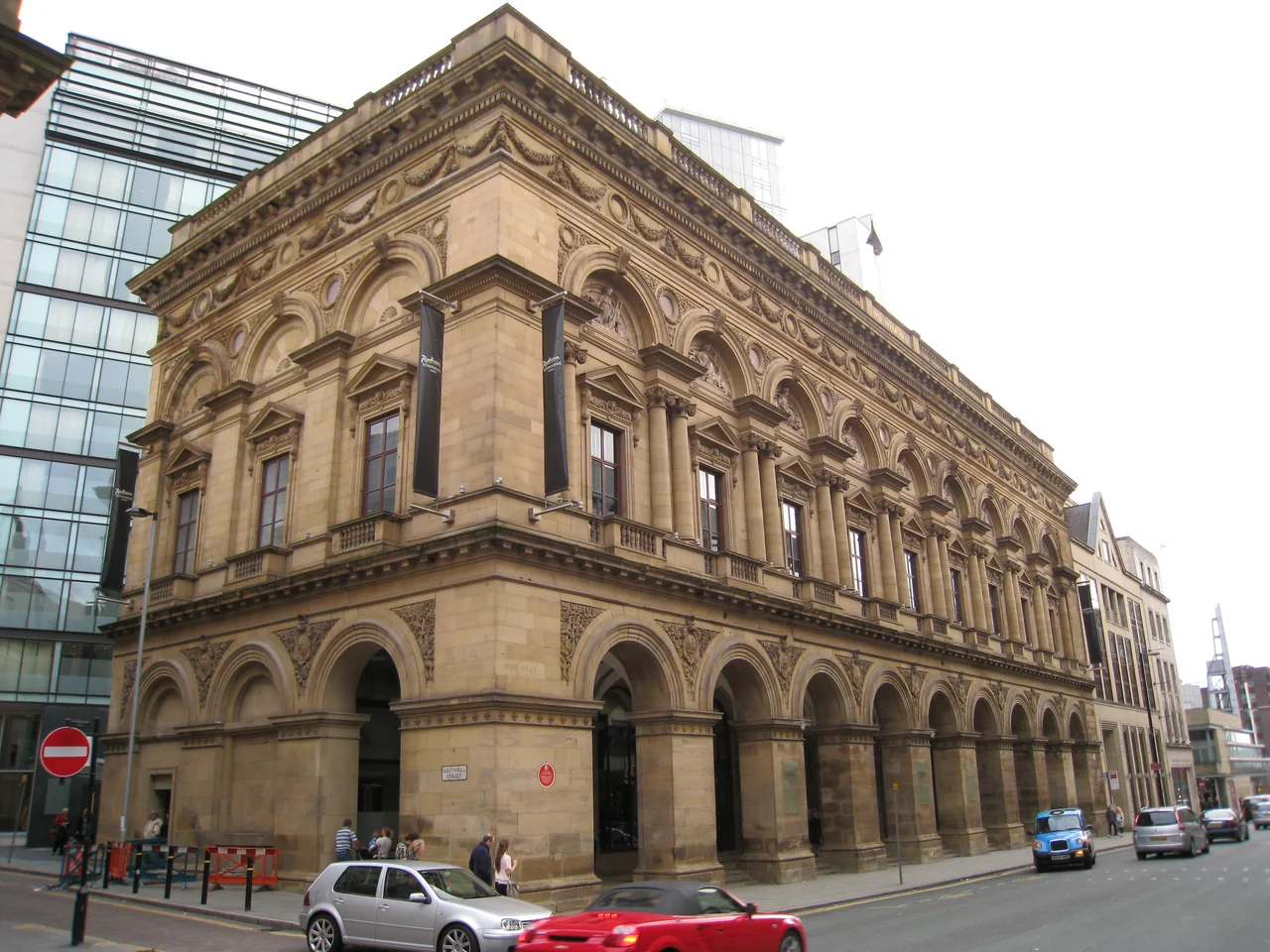 The historical Free Trade Hall building in Peter street.

The building was sold in 1997 and has since been completely rebuilt, only the facade is original. Today it houses the Radisson Edwardian Hotel.