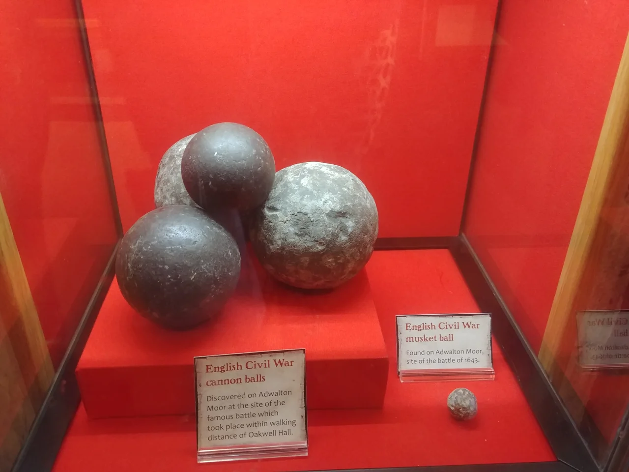 cannon and musjet balls found at Adwaltin Moor on display at Oakwell Hall