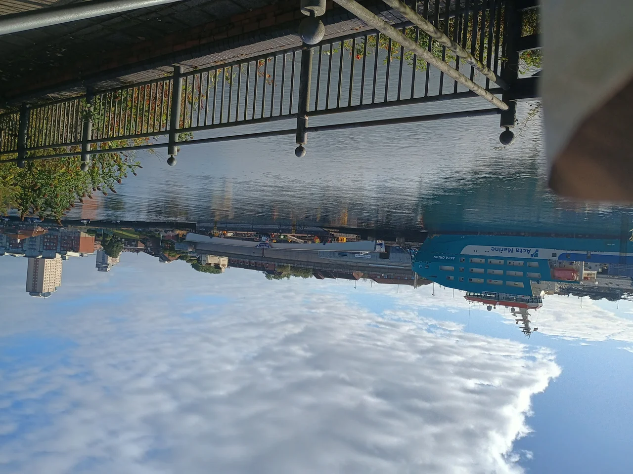 A view over the River Wear in Sunderland showing a section of the Keel Crossing footbridge on board a barge