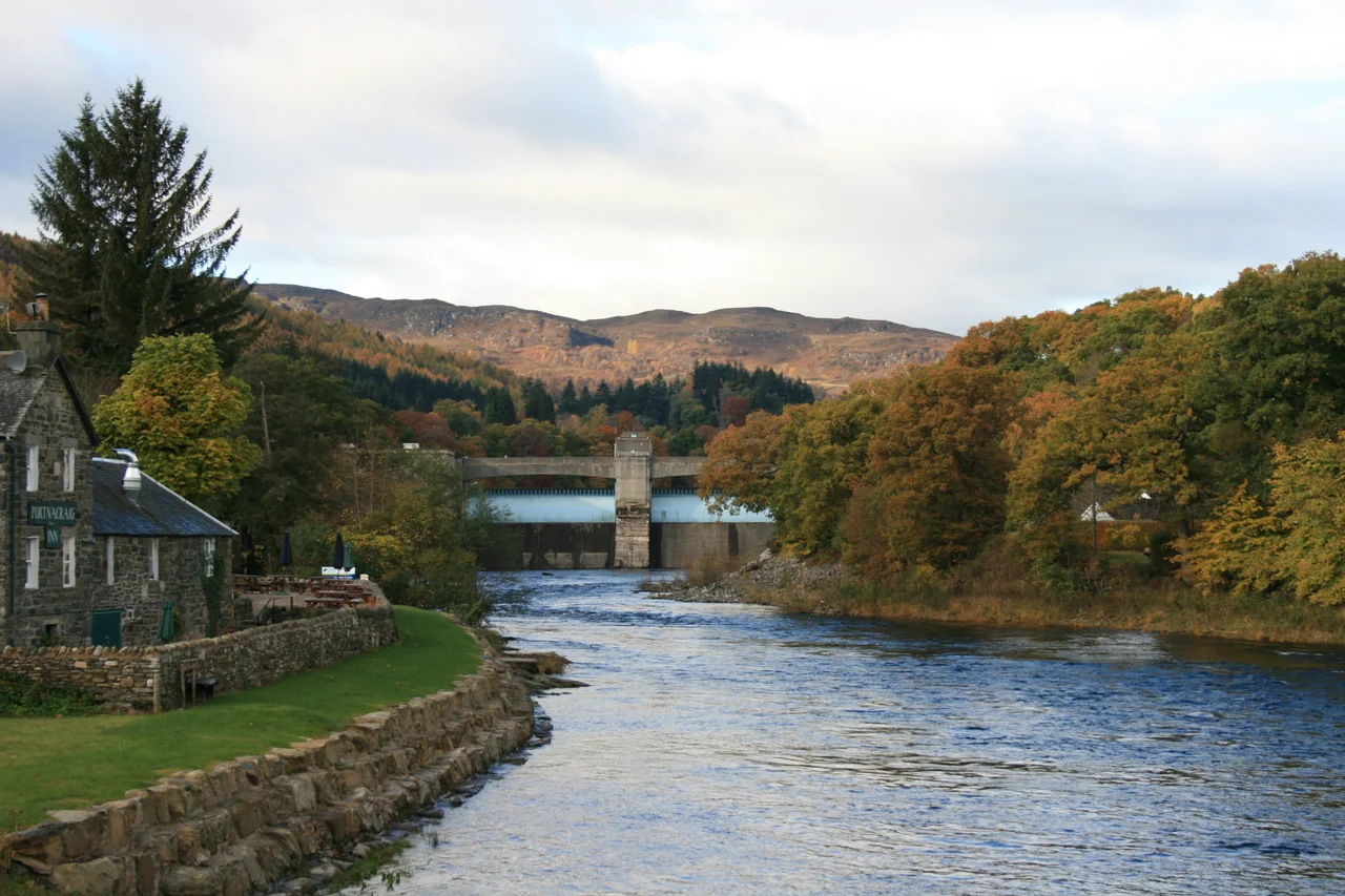 Pitlochry hydro-electric power station and the River Tummel. The Power Station dams the river creating Loch Faskally.
