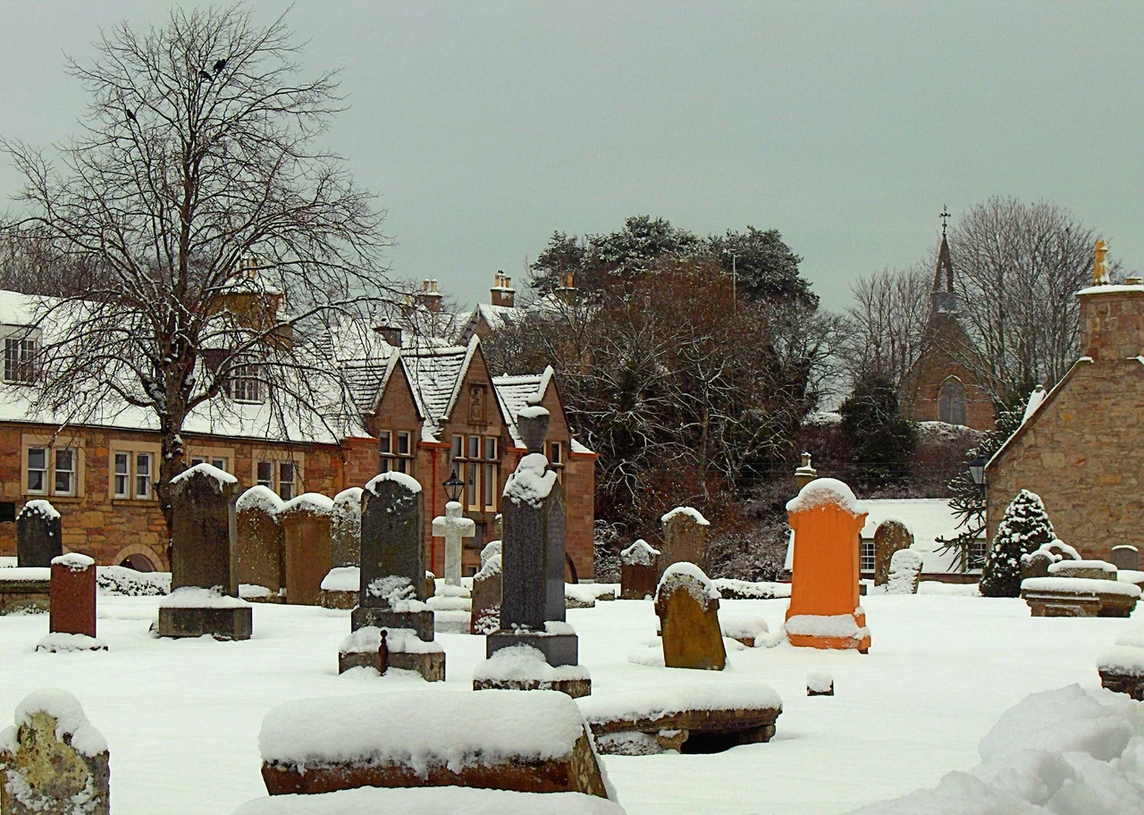 Taken from St. Gilbert's Street looking across to the High Street.
You have to admire the person buried with a bright orange tombstone!