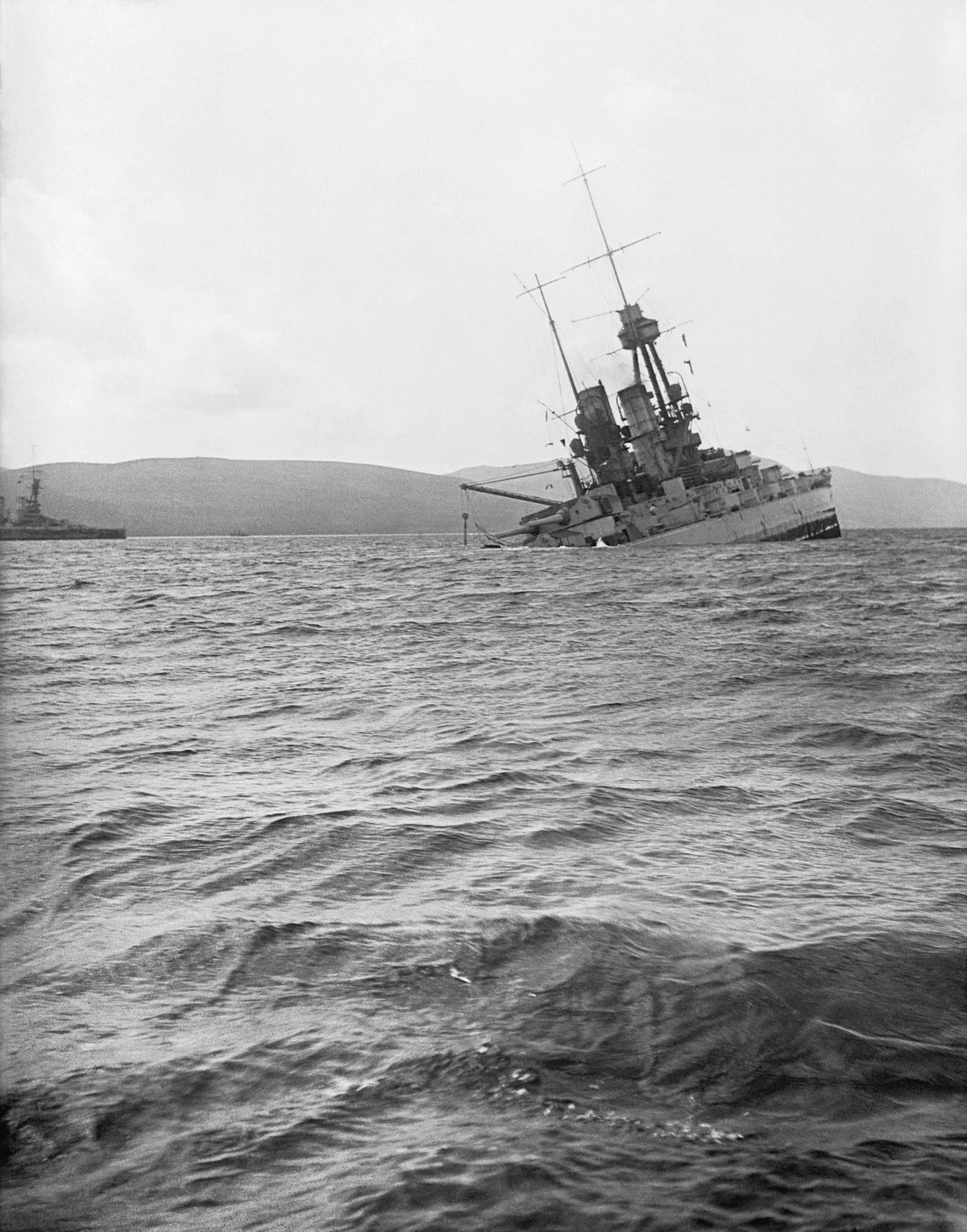 Scuttling of the German Fleet at Scapa Flow: SMS BAYERN down by the stern and sinking at Scapa Flow.