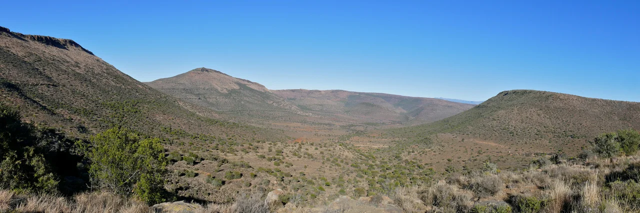 The towering dolerite rock formation known as the Valley of Desolation, an awe-inspiring sight. This geological phenomenon lies within the Camdeboo National Park in the Eastern Cape.