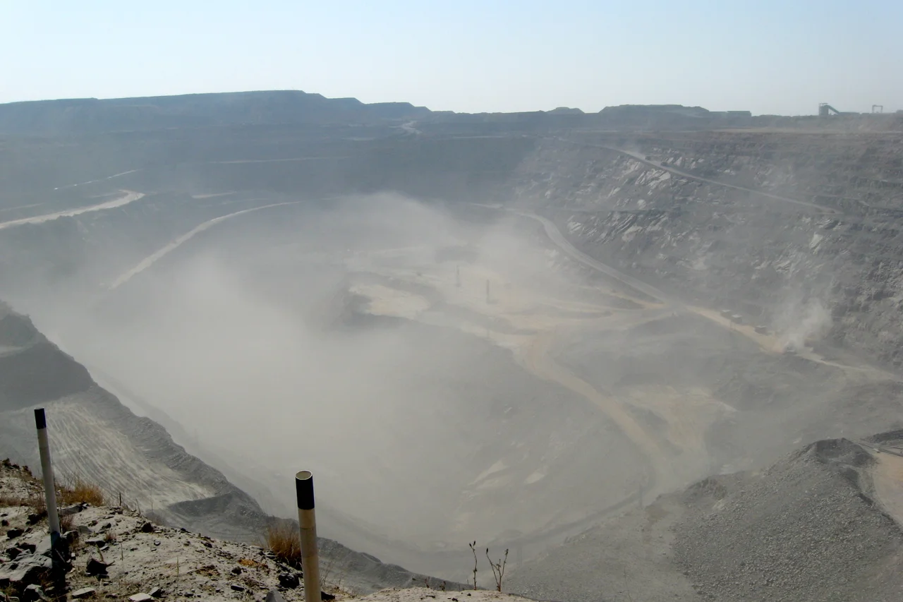 Open mine on a dust-disturbed day, Jwaneng Diamond Mine, Botswana.