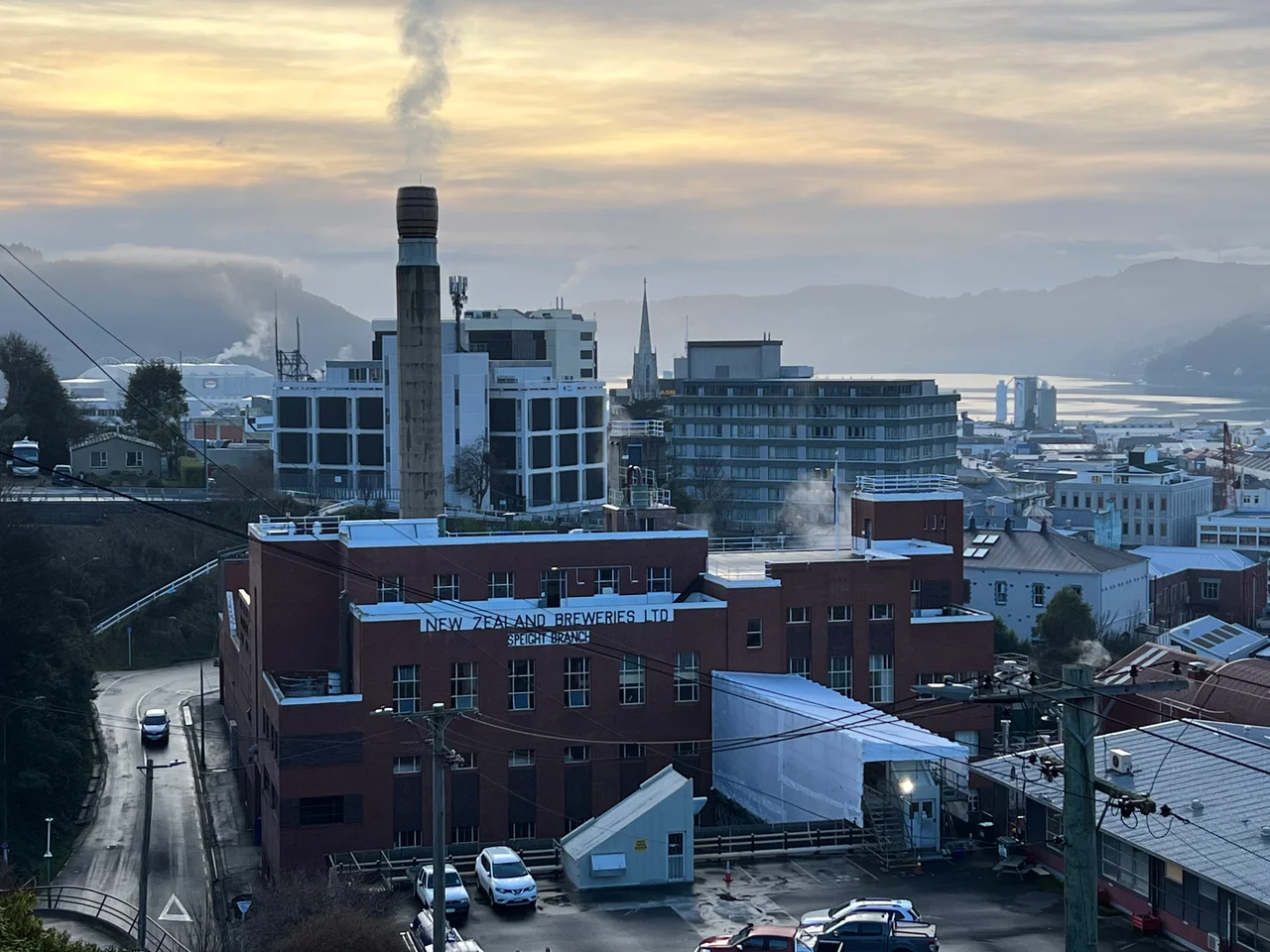 View of part of the Speight's Brewery buildings in Dunedin, New Zealand, showing the iconic beer barrel atop the chimney.