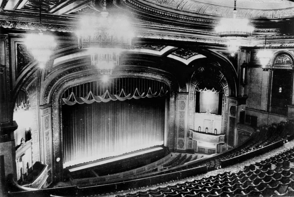 The Hoyts Regent Theatre was built in 1929 and was designed by Charles Hollinshed. The style was both Spanish Gothic and Empire period. Seating at that time was 2,583 patrons and the auditorium was cooled by the first air conditioning in Queensland. Four crystal chandeliers hung from the dress circle ceiling. A WurliTzer Opus no. 2040 theatre organ was installed to entertain the patrons during interval. in the 1950s the organ was dismantled and sold to a private person in New South Wales, but it is now reinstalled in the Queensland Art Gallery's Cinematheque.
The Regent is located in Queen Street Mall, between Albert and Edward Streets and today operates as a cinema complex. The downstairs Cinema One is a likeness to the original theatre.