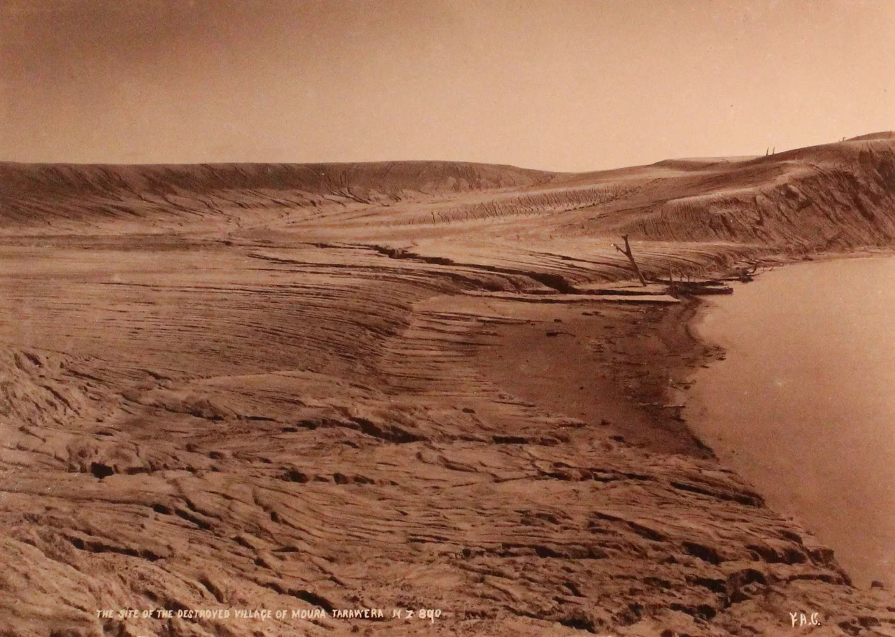 Appears to be a mud flow or lava sloping down toward a lake. A few dead trees visible.
Site of destroyed village of Moura (probably destroyed by the June 1886 eruption of Mt. Tarawera). Inscription reads, "The site of the destroyed village of Moura, Tarawera New Zealand."
Archives Number: 1008-2-1-2-9-45
Keywords: charles appleton longfellow; frank a. coxhead; new zealand; travel