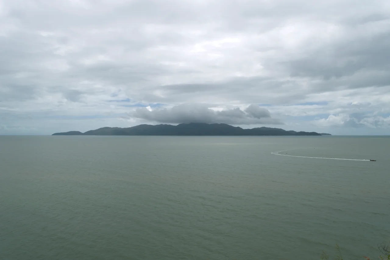 Looking towards the west from Kissing Point over the Coral Sea, with Magnetic Island on the horizon.