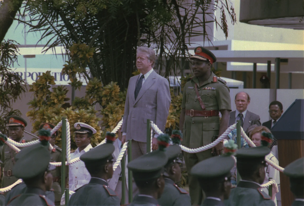 Jimmy Carter and Lt. Gen. Olusegun Obasanjo at the welcoming ceremony for President Carter's visit to Nigeria. - NARA - 178581.tif