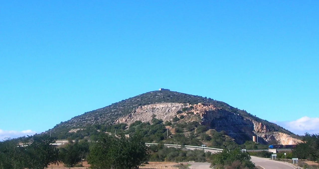 Puig de la Nau; mountain in Benicarló district. Eastern side with Iberian village above the quarry