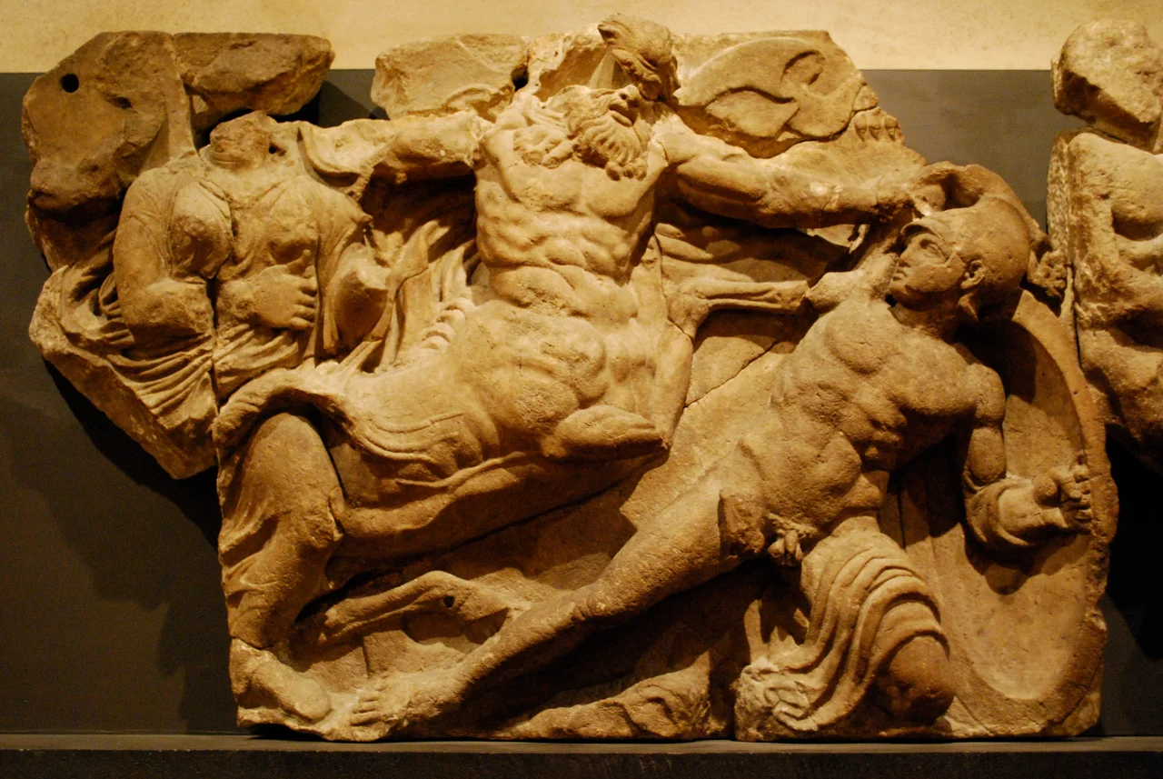 The Bassae Frieze is made from a set of 23 marble panels that were in the Temple of Apollo at Bassae. They were carved just before 400 B.C. The stones are on permanent display in a specially constructed room in Gallery 16 in the British Museum in London. Copies of this frieze decorated the walls of the Ashmolean Museum and London's Travellers Club. (Note the source numbers below show the order of the pictures)