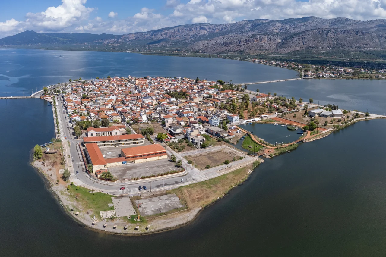 Airview of Aitoliko, West Greece. Aitoliko is located on an islet in the Missolongi Lagoon. It is connected with the mainland via two stone arch bridges.