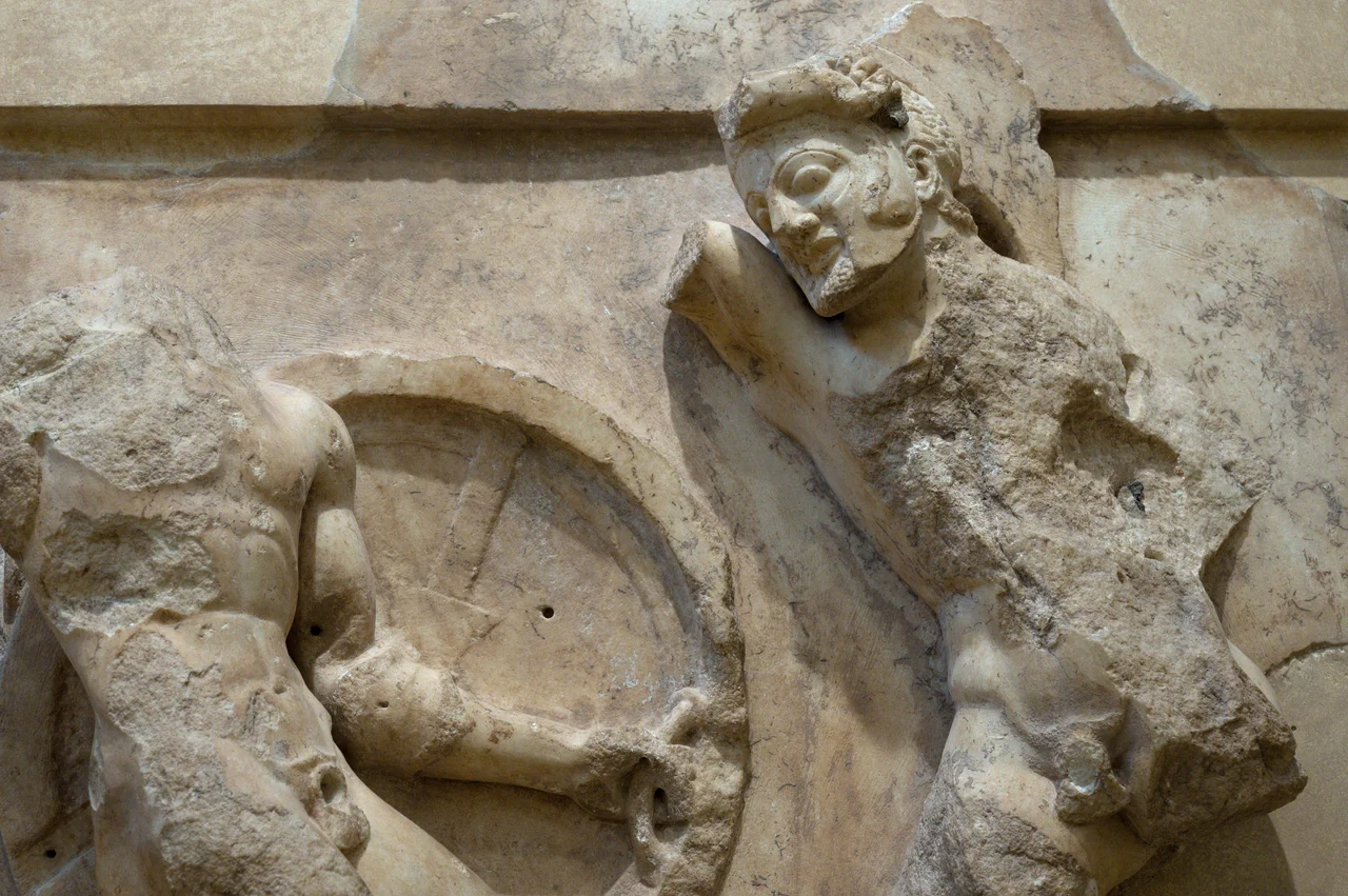 Metope from the Treasury of Athenians at Delphi. Heracles and Kyknos. Theseus battling with the Queen of Amazons, around 500 BC. Archaeological Museum of Delphi.