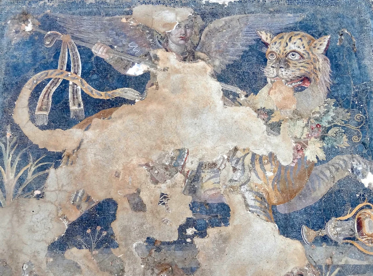 A Hellenistic Greek mosaic depicting the god Dionysos as a winged daimon riding on a tiger, from the House of Dionysos at Delos in the South Aegean region of Greece, late 2nd century BC; sources: * Brecoulaki, Hariclia (2016), “Greek Interior Decoration: Materials and Technology in the Art of Cosmesis and Display”, in Irby, Georgia L., editor, A Companion to Science, Technology, and Medicine in Ancient Greece and Rome (Blackwell Companions to the Ancient World), volume 1, Oxford: Wiley-Blackwell, ISBN 9781118372678, page 678
* Dunbabin, Katherine, M. D. (1999) Mosaics of the Greek and Roman World, Cambridge: Cambridge University Press, ISBN 0521002303, page 32