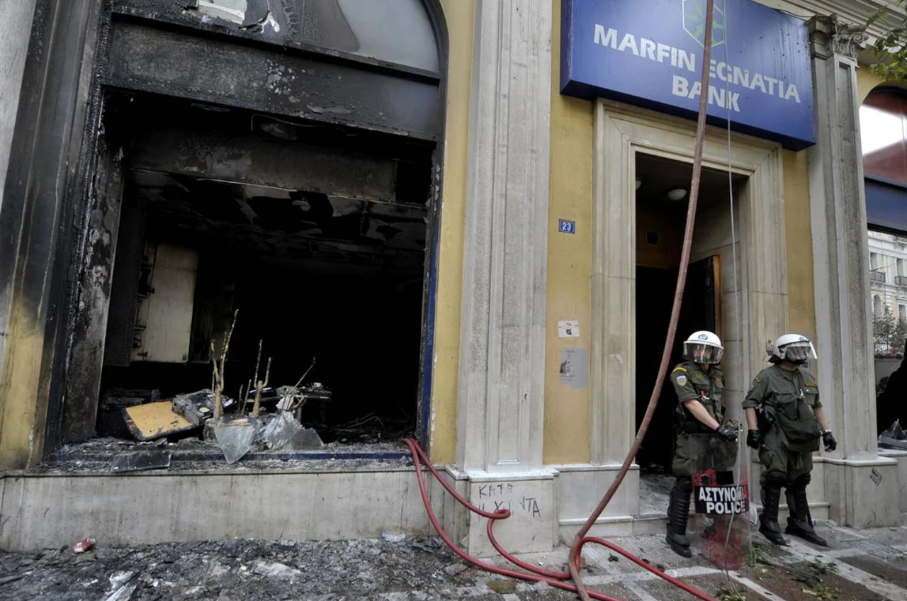 Marfin bank branch burned during protest in Greece