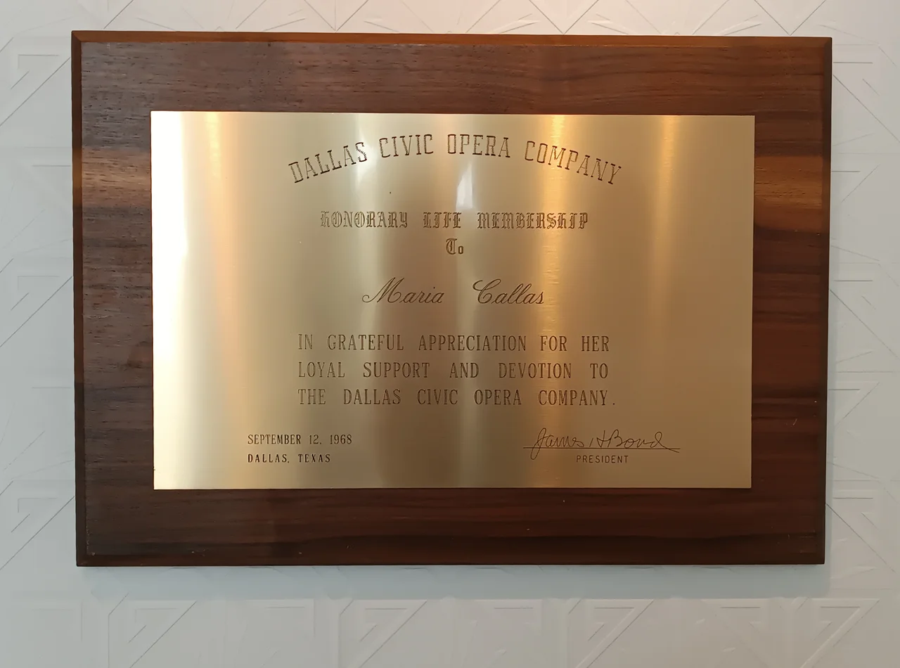 Plaque commemorating the Greek soprano Maria Callas' honorary life membership to the Dallas Civic Opera (now known as the Dallas Opera). Dated 12 September 1968. On display at the Maria Callas Museum in Athens.