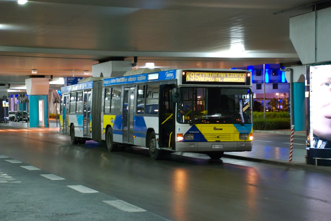 Photograph of a bus for line X95 (Syntagma Express) at Athens International Airport. Taken before sunrise.