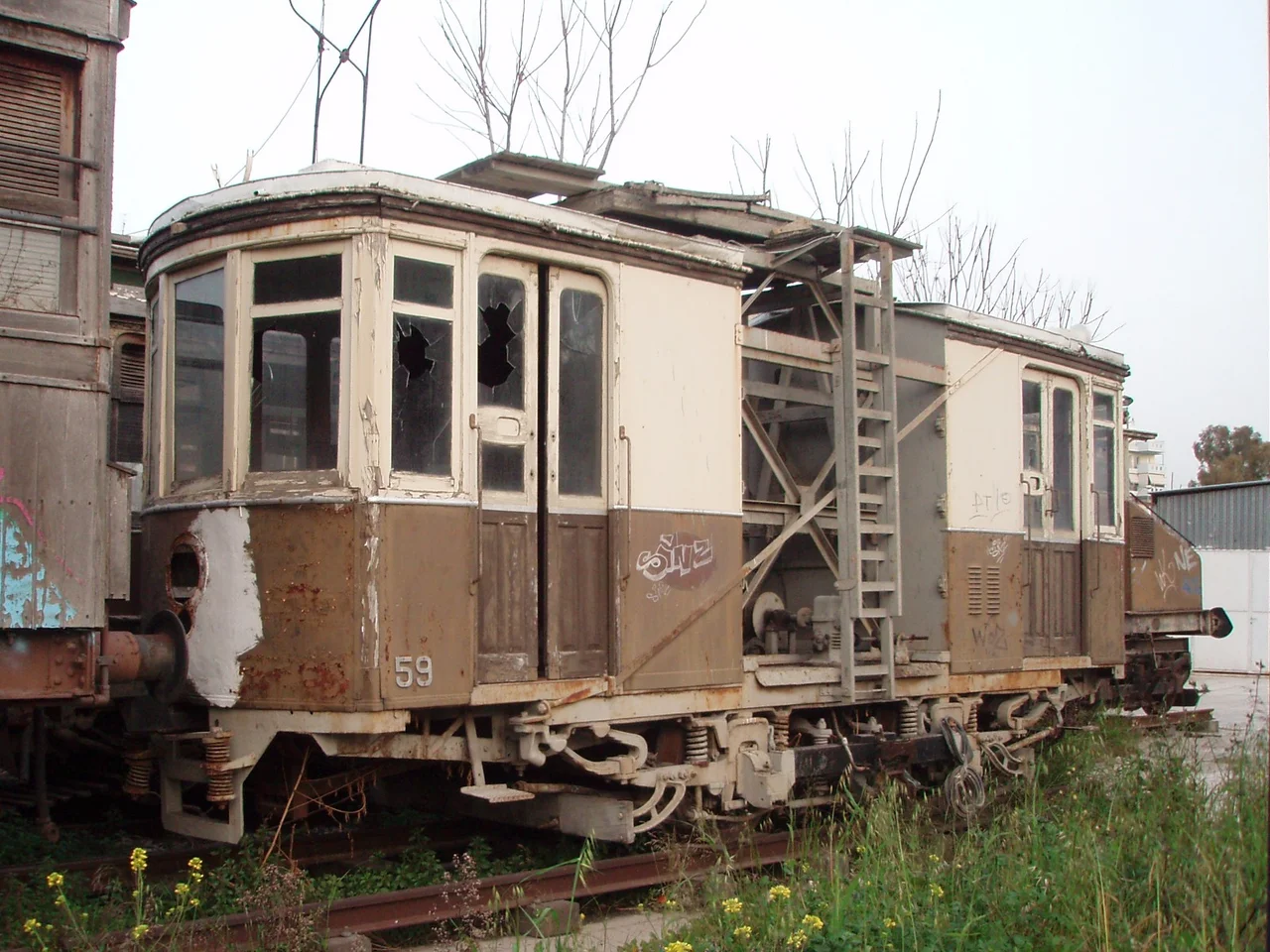 Overhead line maintenance railcar ΕΗΣ 59 of the Piraeus Harbour Tramway, in storage outside Athens Railway Museum.