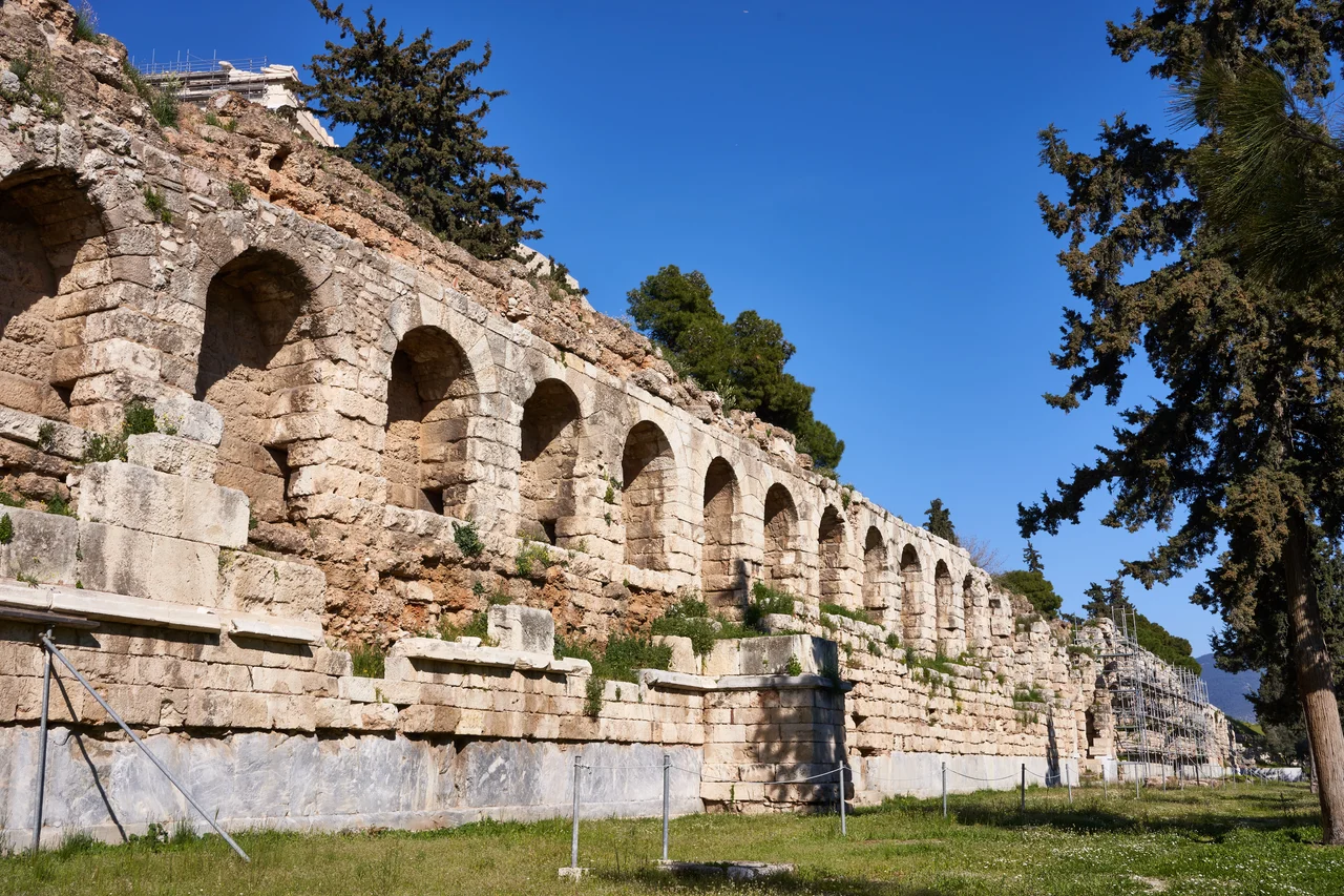 The remains of the Stoa of Eumenes in Athens. The stoa lies between the Odeon of Herodes Atticus and the Theatre of Dionysus. This is a view from the side of the Odeon.