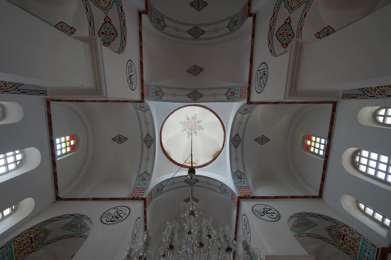 The Bodrum Mosque has nothing to do with the town Bodrum: bodrum is Turkish for a cellar, and the mosque, a former church, has a large cellar, or rather a crypt, that used to be hidden in the ground, but excavated in 1965. It contained the graves of the founder of the church and some others (not visible, a fresco is visible)