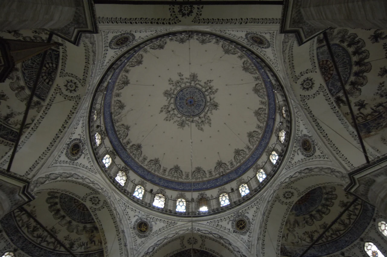 The complex can be considered either the last of the great classical buildings or the first of the new baroque style, having characteristics of both, At the corner of the precinct is a very beautiful sebil in the new rococo style. The mosque is raised on a platform containing a cistern, its form is pure classical. Tiles are not Iznik, but from the recently established kilns at Tekfur Saray. (Info from Strolling through Istanbul, guidebook)