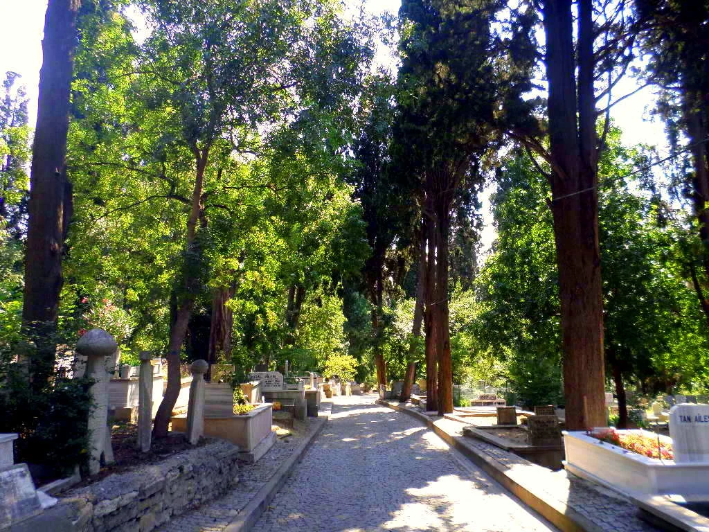Shady cobblestone cemetery pathway, Karacaahmet cemetery, Istanbul