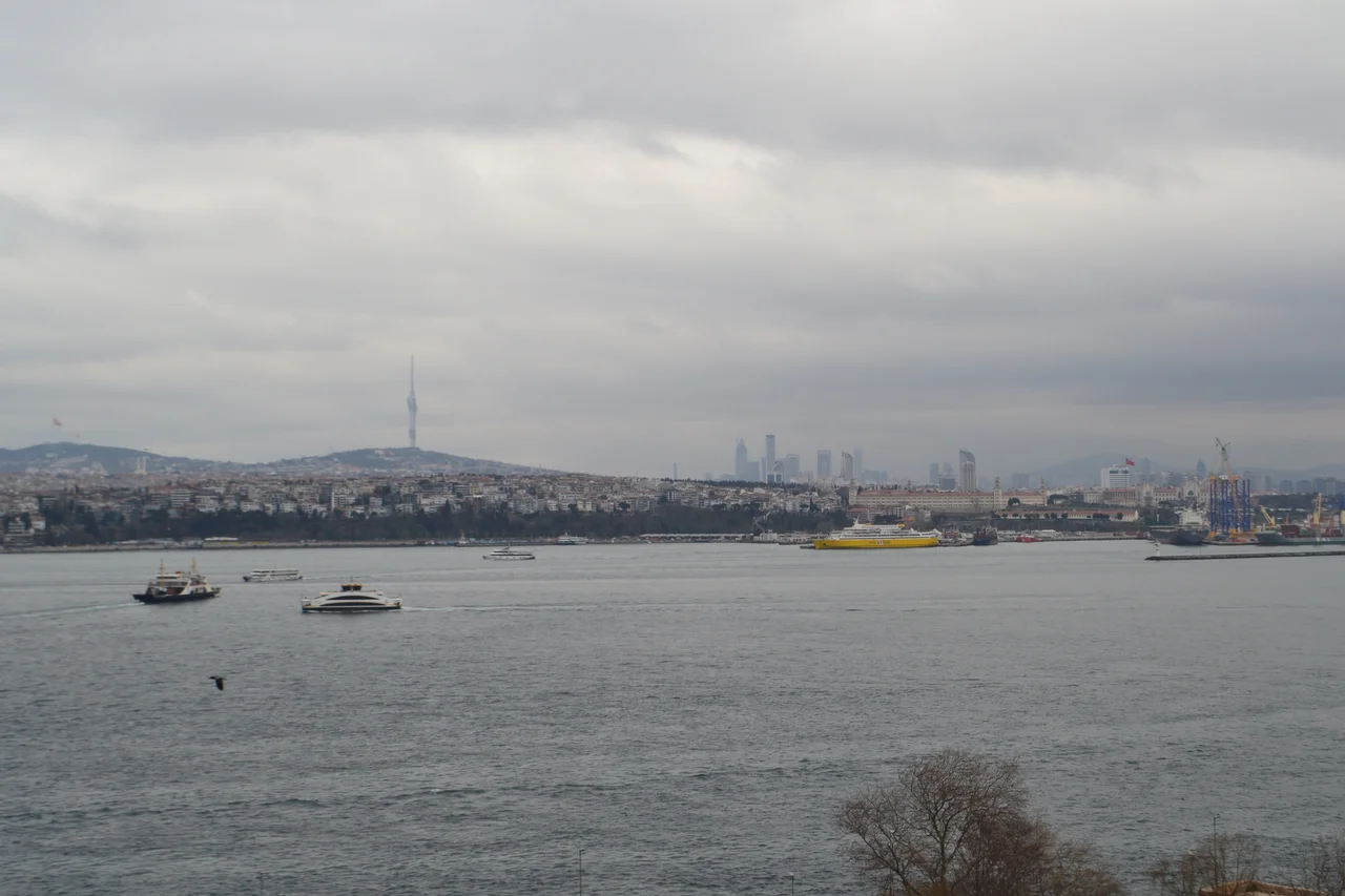 Selimiye Barracks can be seen on the right side, right behind the ship with a yellow hull.