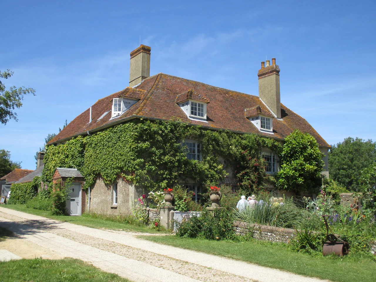 Charleston, a grade II* listed farmhouse about a mile east of West Firle, in East Sussex, seen from the south-east.