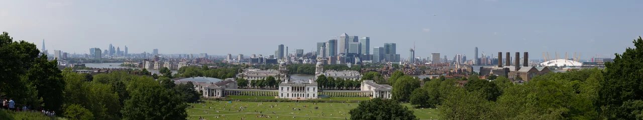 A 12 image panorama of the view from Greenwich Park, with the Queen's House in the foreground. The Old Royal Naval College and Docklands are in the background. In the distance and to the left, St. Pauls Cathedral and Tower Bridge can be seen. The Greenwich Park view offers one of the best panoramic views in London.