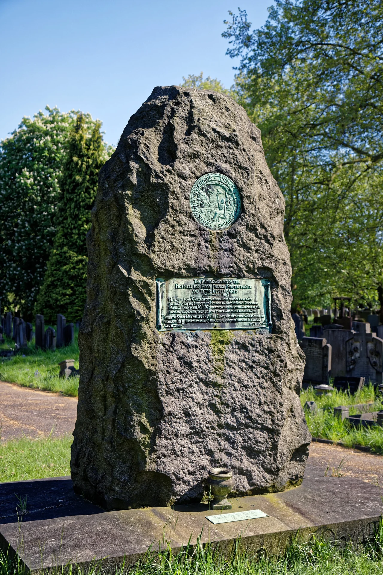 The Hospital for Poor French Protestants, French Hospital (La Providence), memorial monument at the southeast of the Traditional Crematorium in the City of London Cemetery, Aldersbrook Road, Newham, England.Camera: Canon EOS 6D Mark II with Canon EF 24-105mm F4L IS USM lens.Software: RAW file lens-corrected, optimized and converted with DxO OpticsPro, and further optimized with Adobe Photoshop CS2.