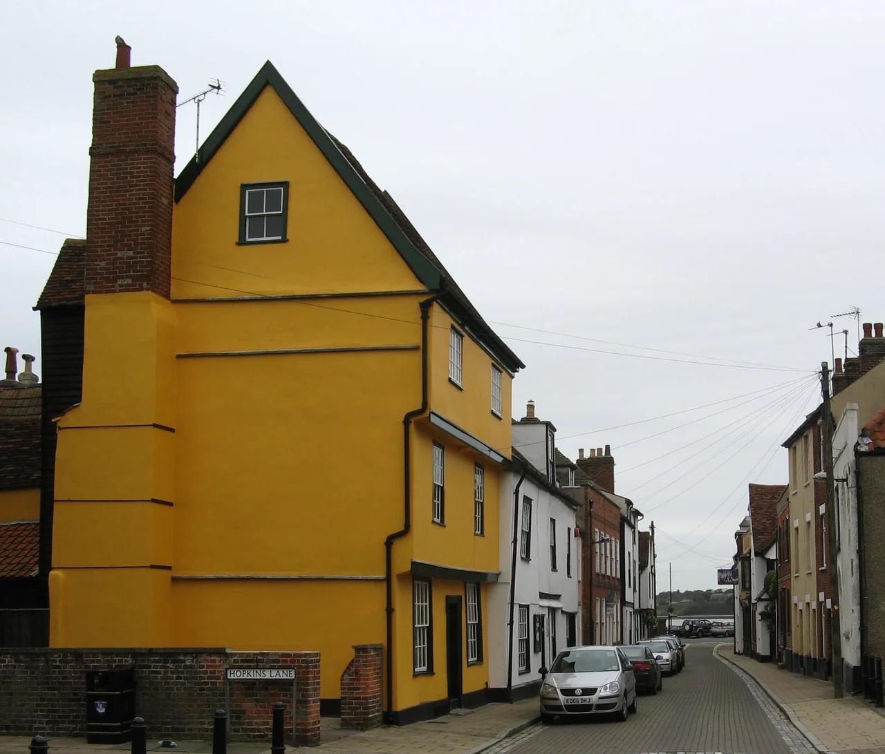 Quay end of King's Head Street, Harwich, looking toward quay and harbour from junction with Saint Austins Lane. The Alma Inn sign is visible near the quay.