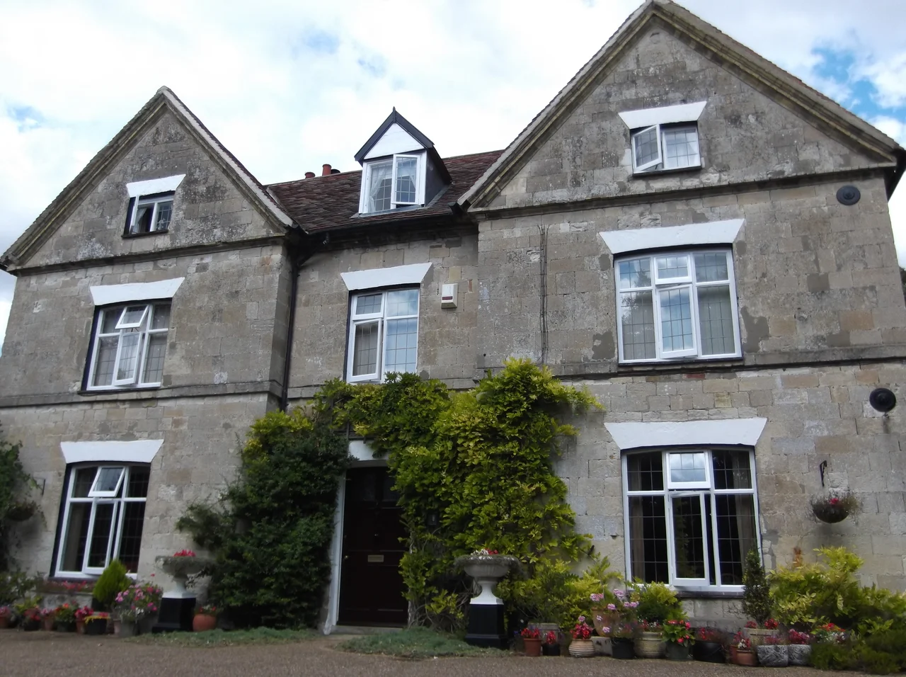 Photograph of Spinney Abbey, Cambridgeshire - house incorporating masonry from Spinney Priory