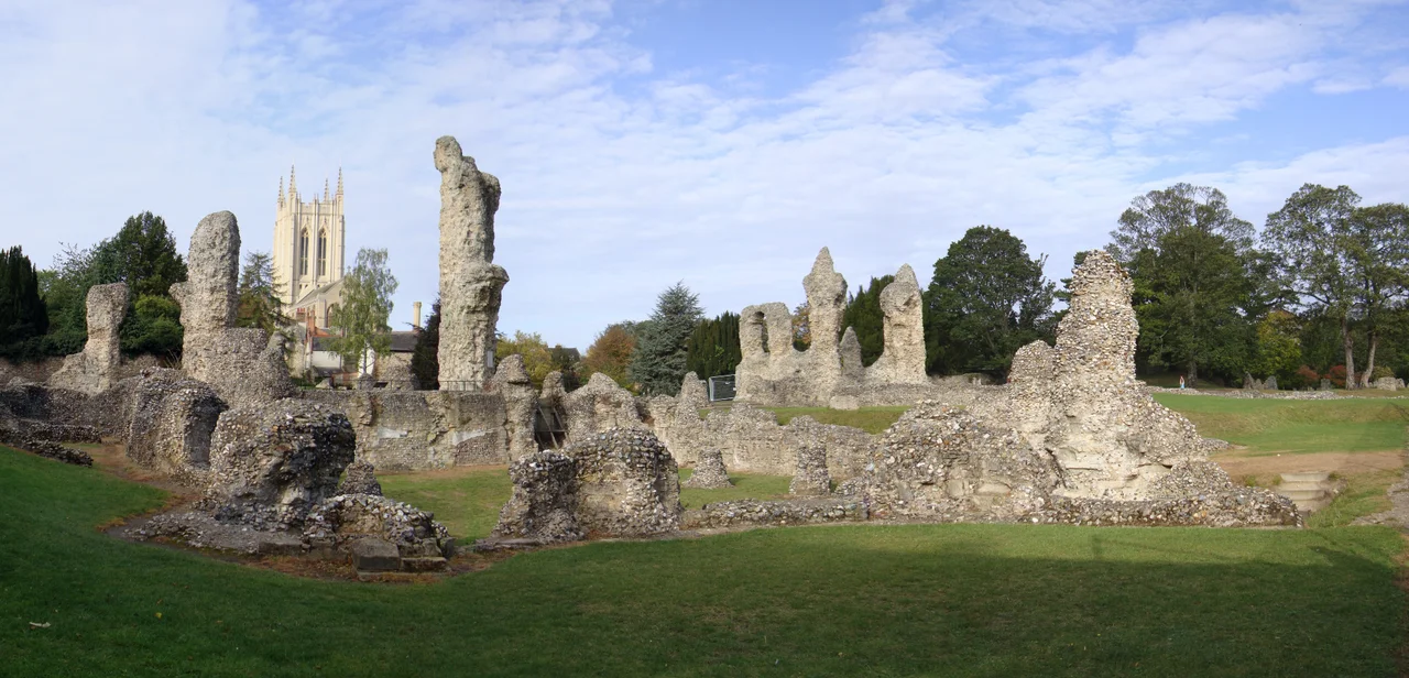 Composite panorama photograph of the remains of Bury St Edmunds Abbey, Suffolk, England, with the tower of St James' Cathedral in the background